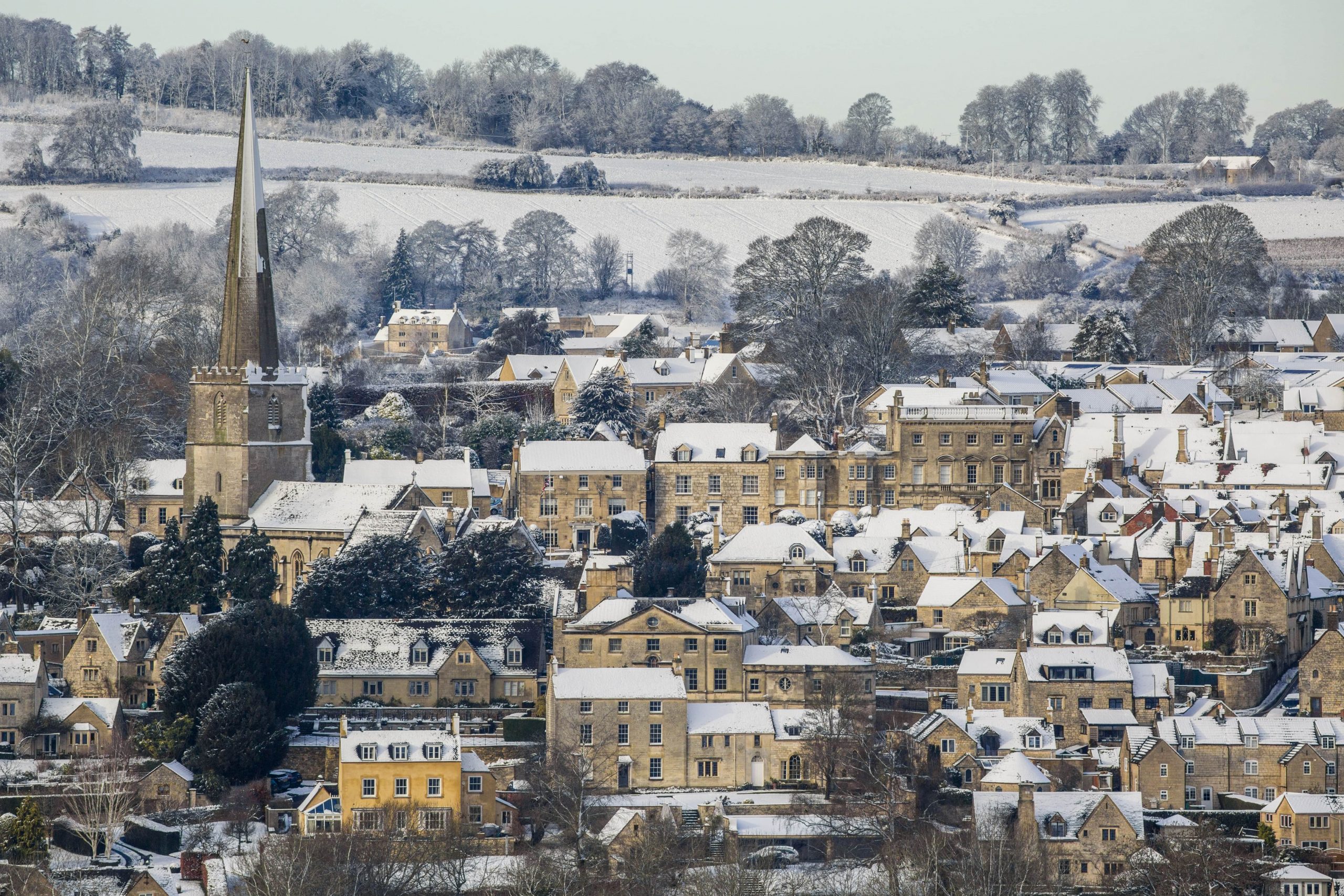 The picturesque village of Painswick in the Cotswolds after a snowfall, Gloucestershire. What's On in Gloucestershire and Stroud Christmas 2022